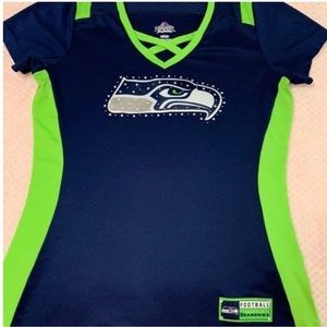 Woman’s size Medium Rate majestic tee with rhinestone’s .